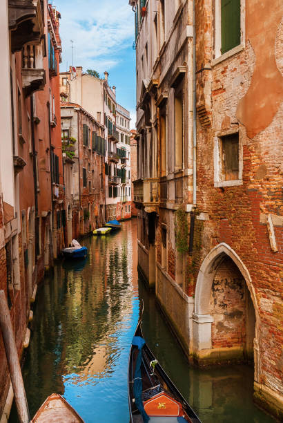 istock Venice canal view with gondola 1200099952