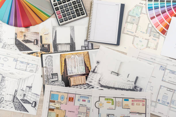 istock architect work - drawing sketch plans blueprints with color palette for help 1200101591