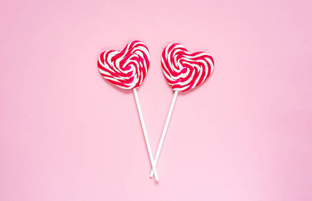 istock Heart candy on a stick, lollipops, flat lay, minimalism, copy space for text, Valentine's day, love 1200102885