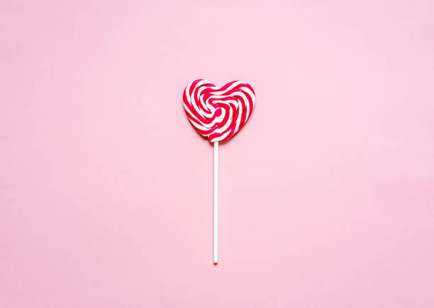 istock Heart candy on a stick, lollipops, flat lay, minimalism, copy space for text, Valentine's day, love 1200102886