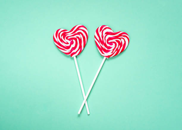 istock Heart candy on a stick, lollipops, flat lay, minimalism, copy space for text, Valentine's day, love 1200102889