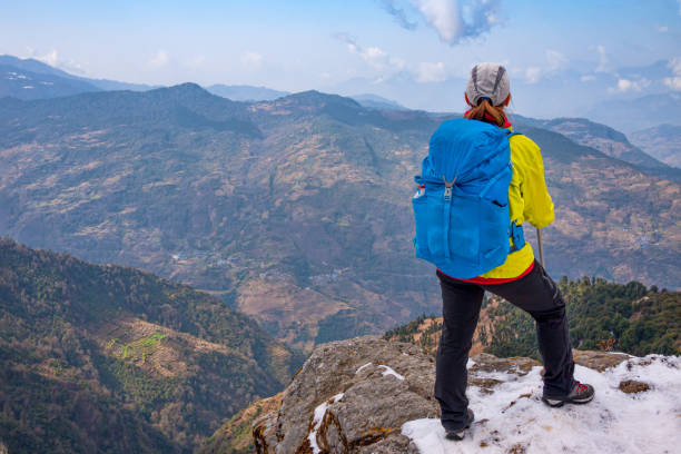 istock Woman hiking in mountains 1200102927