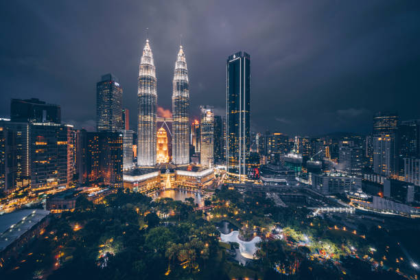 Kuala Lumpur Skyline at KLCC with Petronas Towers at sunset.