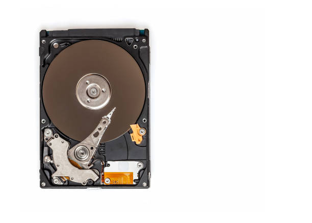 istock Portable hard drive disassembled showing its internal components - isolated on white, top view with copy space 1200104880