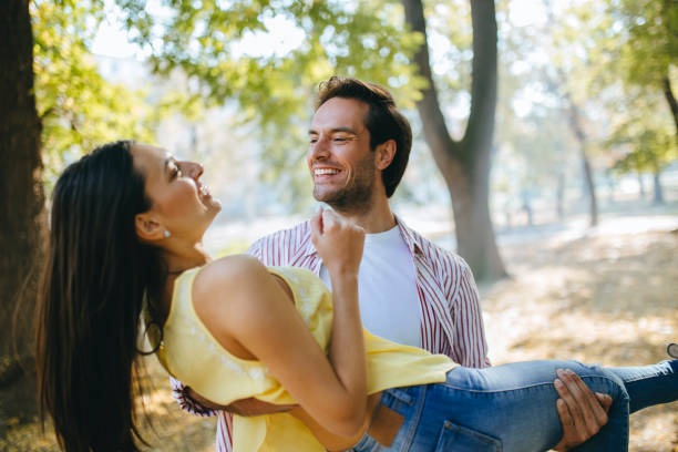 istock Couple in public park 1200105974
