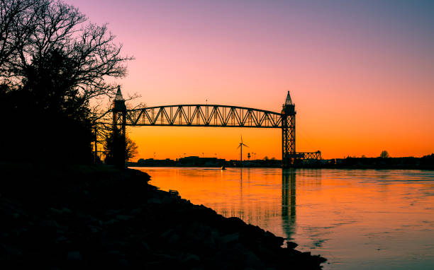 istock Cape Cod Canal Railroad Bridge and Riverbank at Dusk 1200110772