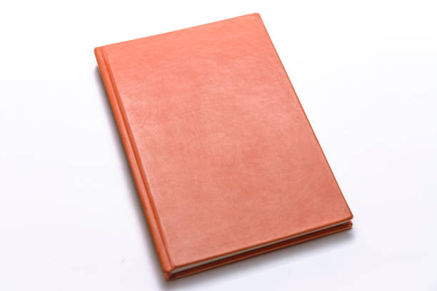 diario libro a trama arancione - brown book foto e immagini stock