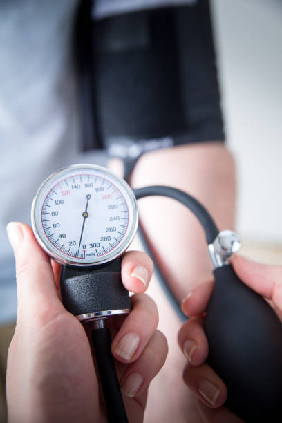血圧計 - healthcare and medicine doctor medical exam blood pressure gauge ストックフォトと画像
