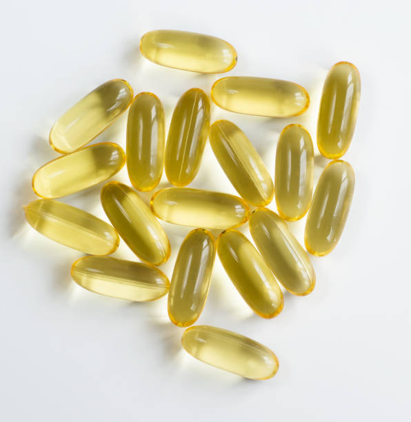 istock Large capsules with fish fat Omega-3 for the cardiovascular system. View from above 1200114869
