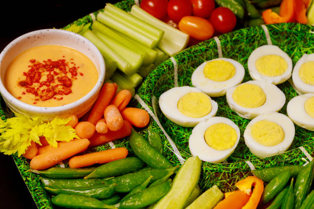 istock Boiled eggs with vegetable platter and dipping sauce, ranch. 1200115273