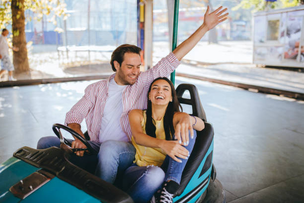 istock Couple have fun in Amusement park 1200117230