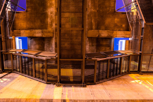 istock Steel metal wire mesh stairs under the bridge, shot from a low angle 1200122659