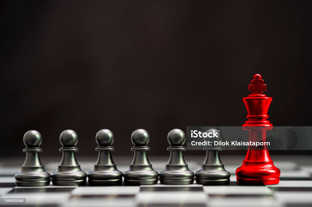 Red king chess with others black pawn chess for leader and different thinking.Disrupt concept. Leadership Stock Photo