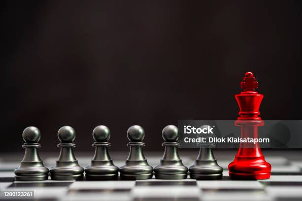 Red King Chess With Others Black Pawn Chess For Leader And Different Thinkingdisrupt Concept Stock Photo - Download Image Now
