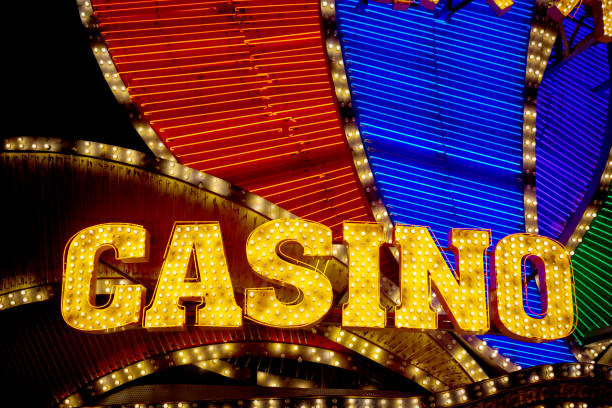istock Casino sign lit with bulbs and neon lights 1200126019