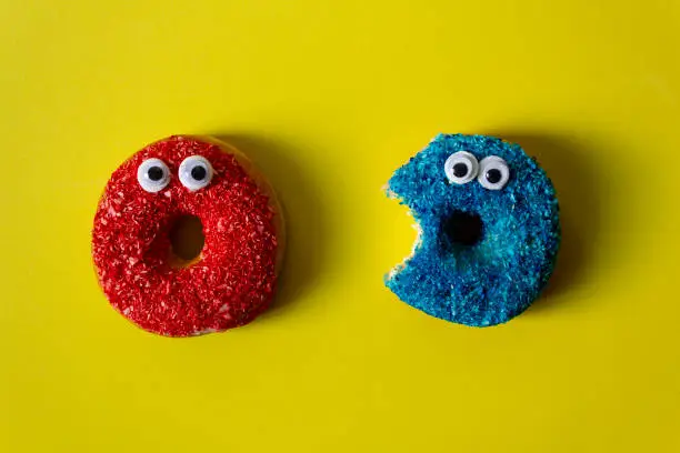Photo of Colorful donuts with googly eyes