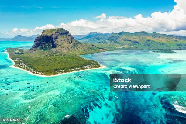 Aerial Panoramic View Of Mauritius Island Detail Of Le Morne Brabant Mountain With Underwater Waterfall Perspective Optic Illusion Wanderlust And Travel Concept With Nature Wonders On Vivid Filter Stock Photo - Download Image Now