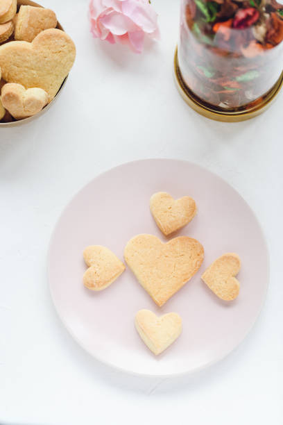 istock Heart shaped butter cookies and rose 1200127440