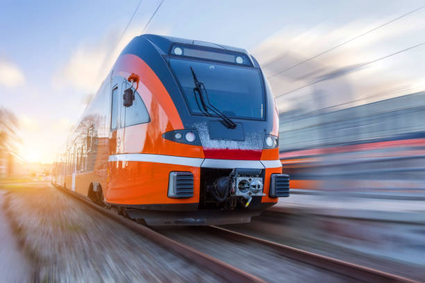 istock Suburban electric train on a blurred motion background. 1200129276