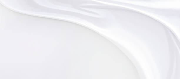 istock White gray satin texture that is white silver fabric silk background with beautiful soft blur pattern natural. 1200129601