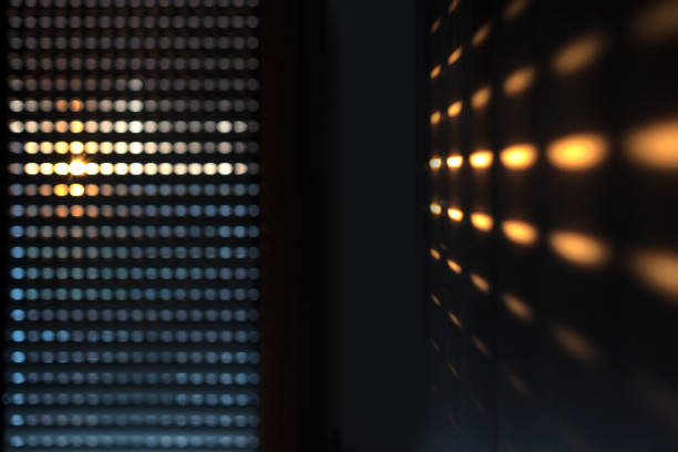istock Shutters - blinds with sunlight in the morning. Soft focus abstract background 1200129960