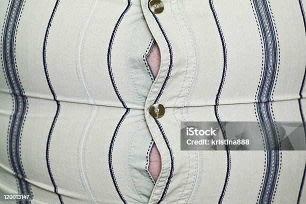 Closeup Of Shirt That Is Too Tight Depicting Weight Gain Stock Photo - Download Image Now