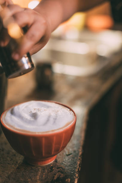 Young Barista Preparing A Bowl Of Latte Coffee