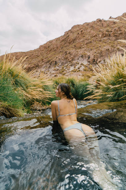 istock Woman in hot spring in Atacama desert 1200132679