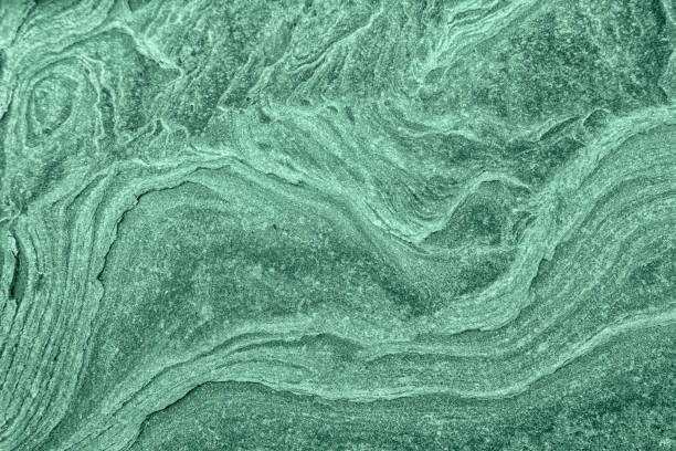 istock Stone textured background with roughness toned in neo mint color. 1200134468
