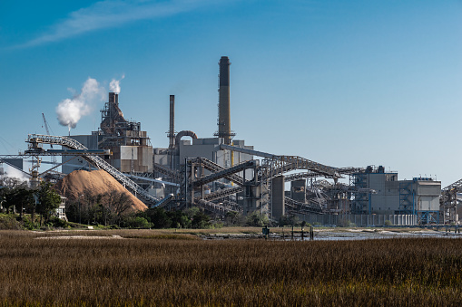 View of paper mill over marsh wetlands in Northeast Florida.