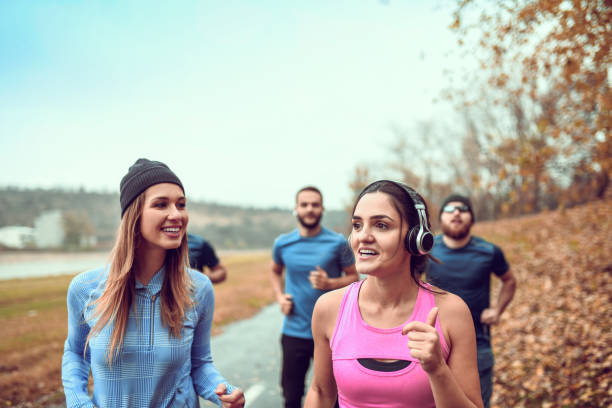 istock Athletes Going For A Jogging Session in Park During Autumn 1200135812