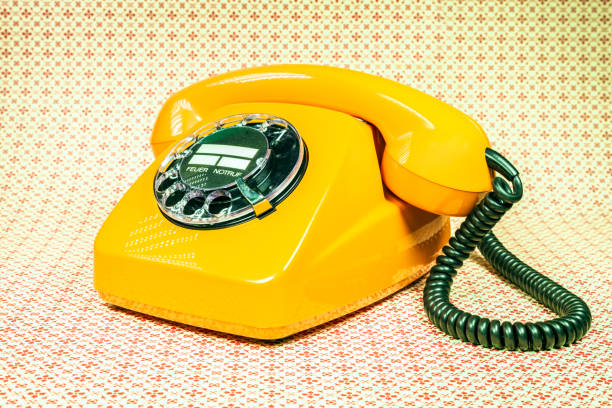 istock Old orange telephone from Germany 1200136258