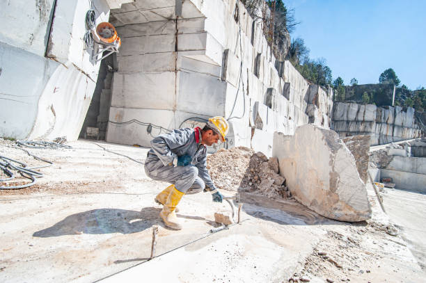 istock Blue-collar Worker Working in Marble Quarry - Stock Photo 1200143132