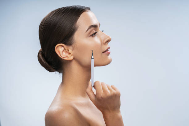 istock Nice Caucasian girl is ready for beauty procedures against light background 1200145687