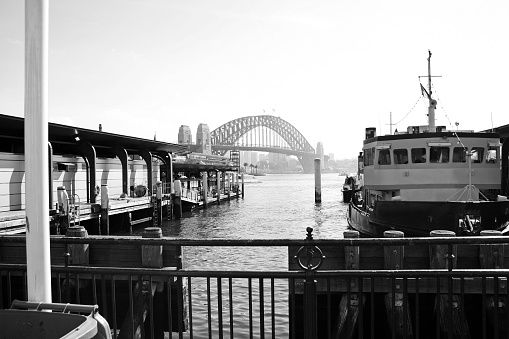 Panorama view of boat on the water  against the  sky in black and white.
