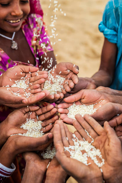 istock Poor Indian children asking for food, India 1200145799