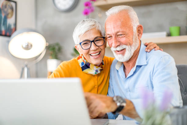 istock Smiling senior couple shopping online. 1200150148