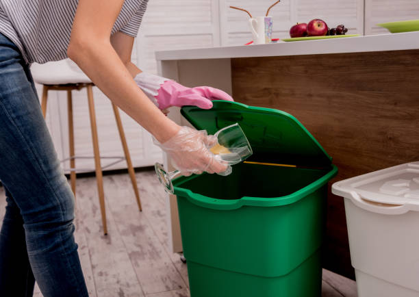 istock Young girl sorting garbage at the kitchen. Concept of recycling. Zero waste 1200160126