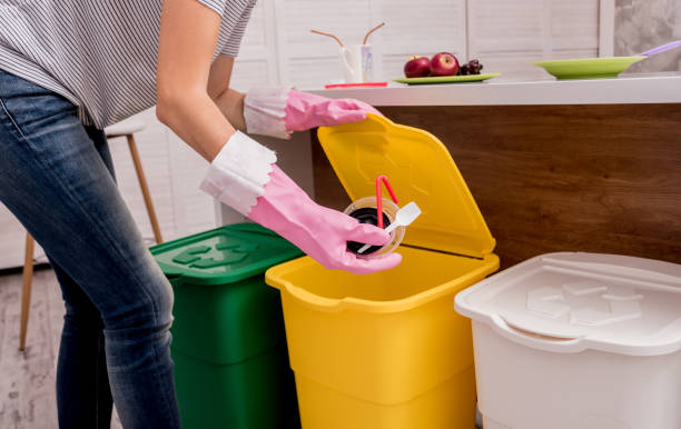 istock Young girl sorting garbage at the kitchen. Concept of recycling. Zero waste 1200161247