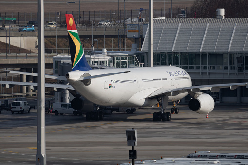 Munich / Germany - February 5, 2018: South African Airways Airbus A330-300 parking and boarding at Munich Airport