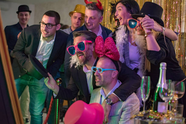 istock group of friends enjoying party 1200163362
