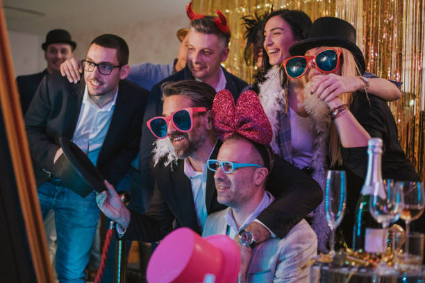 istock group of friends enjoying party 1200163399