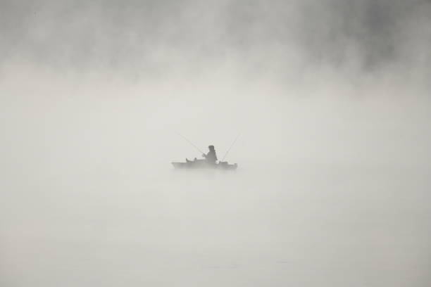 istock Fisherman in the Fog 1200165250
