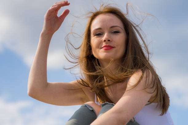 istock Girl relaxing outdoor enjoying sunlight 1200165430