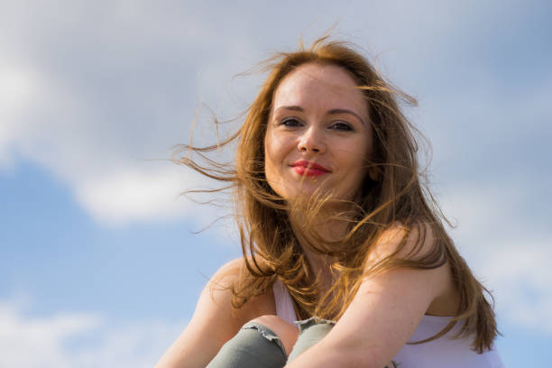 istock Girl relaxing outdoor enjoying sunlight 1200166129