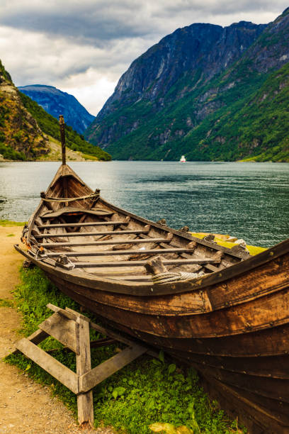 istock Old viking boat on fjord shore, Norway 1200169701