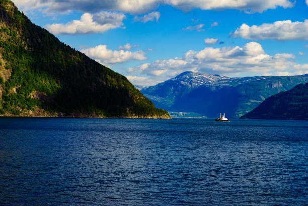 istock Fjord landscape with ferry, Norway 1200169952