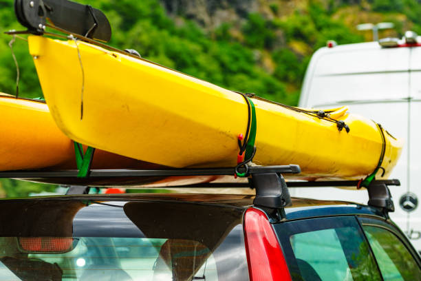 istock Car with canoe on top roof 1200169975