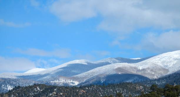 Snowy Mountain View in Santa Fe Snowy NM landscape santa fe new mexico mountains stock pictures, royalty-free photos & images