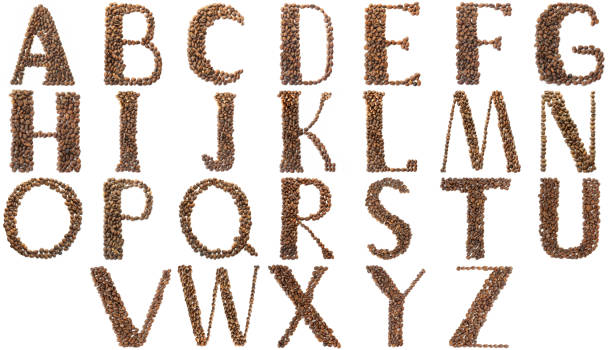 istock English alphabet. Alphabet with coffee beans on a white background. 1200176995